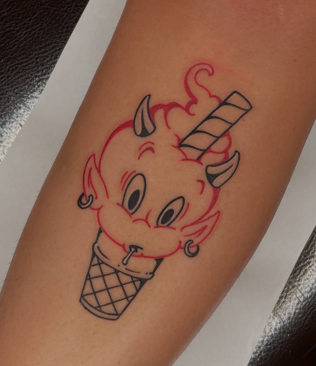 Playful devil-themed ice cream tattoo design Tattoo Design
