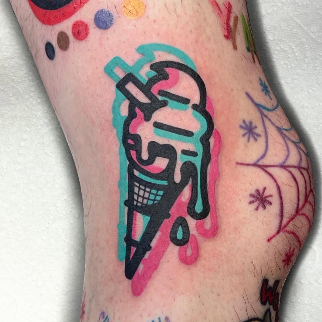 Whimsical ice cream cone tattoo on the leg Tattoo Design