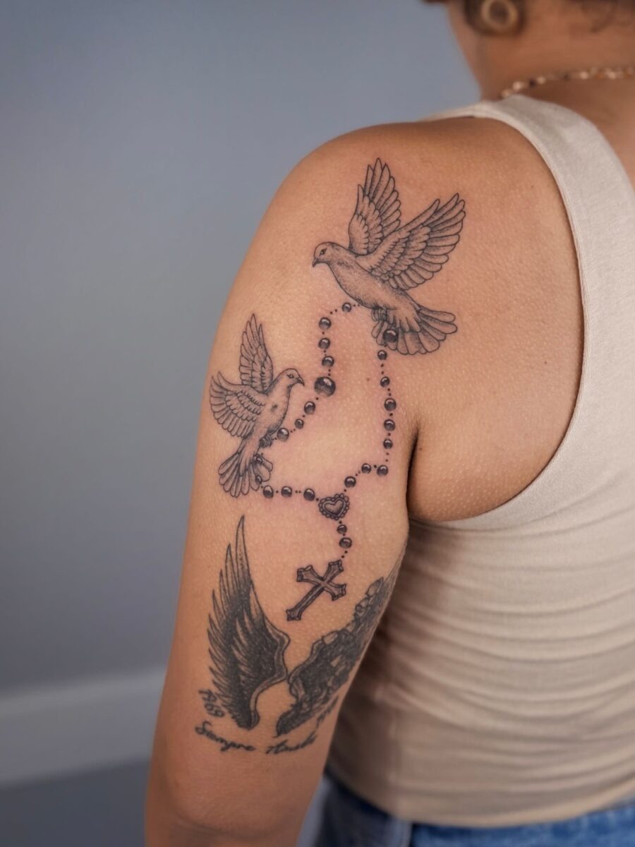 Beautiful tribute tattoo featuring birds and cross Tattoo Design