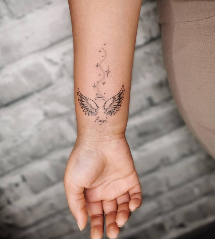 Elegant angel wings with shining stars tattoo Tattoo Design