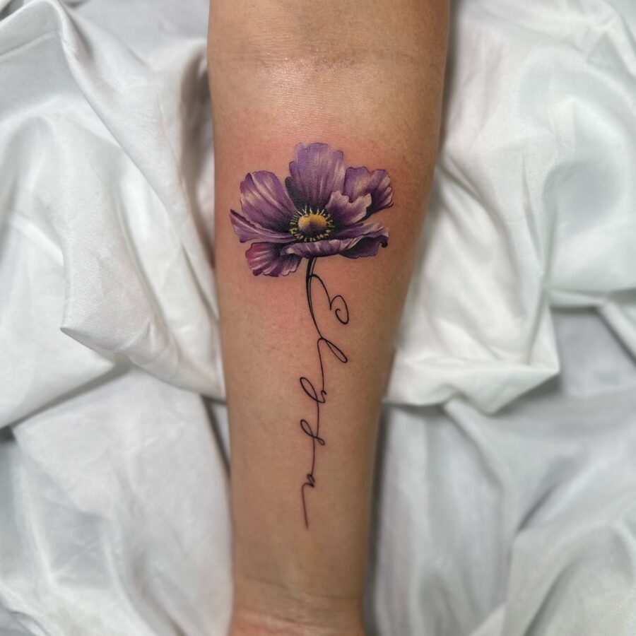 Elegant Floral Tribute Tattoo with Signature Tattoo Design