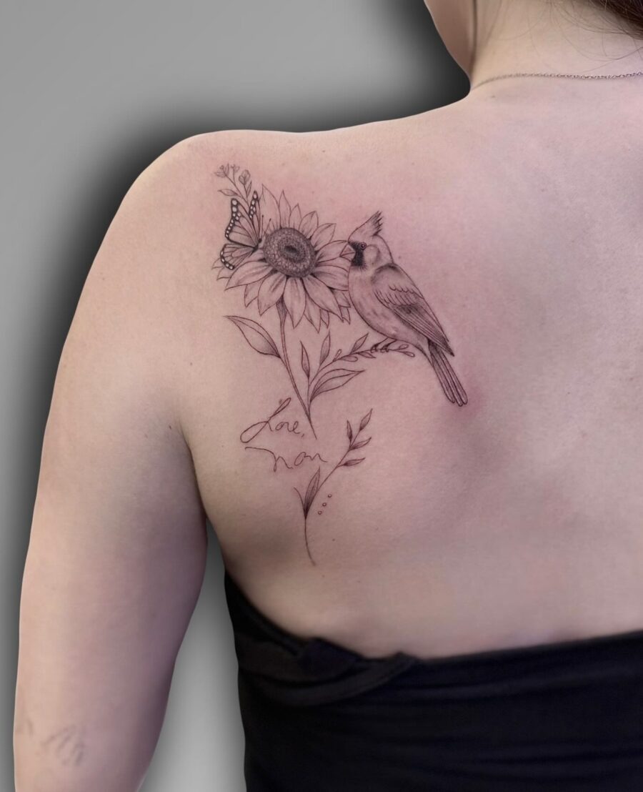 Elegant tribute tattoo featuring a bird and sunflower Tattoo Design