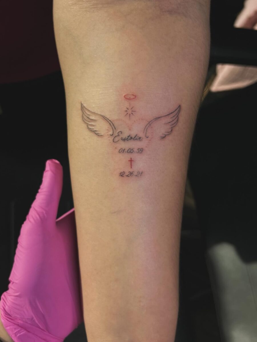 Elegant tribute tattoo with angelic motifs Tattoo Design