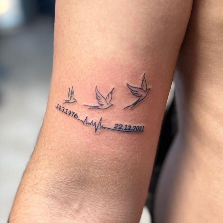 Elegant tribute with flying birds and heartbeat Tattoo Design