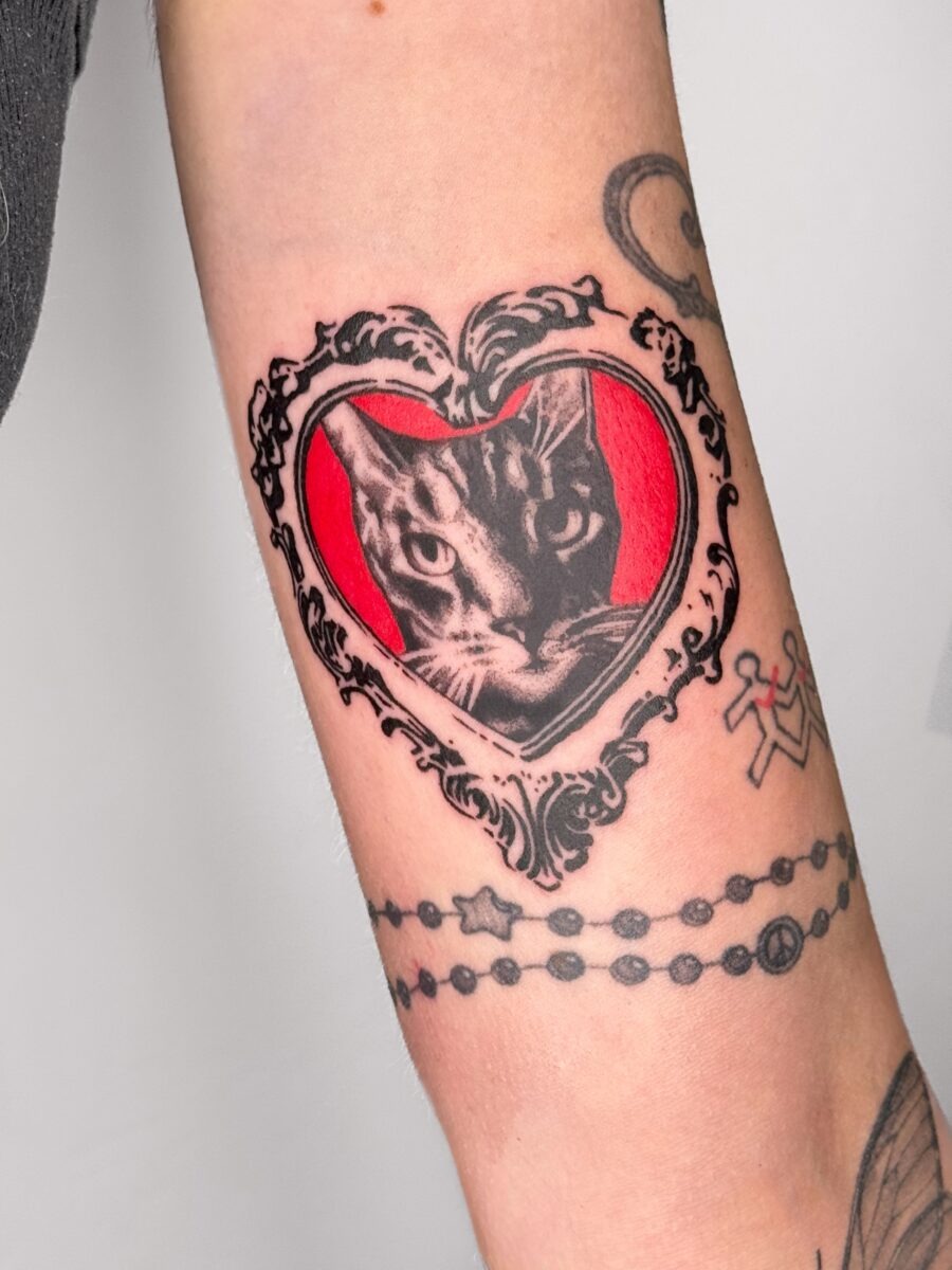 Heartfelt tribute to a beloved feline companion Tattoo Design