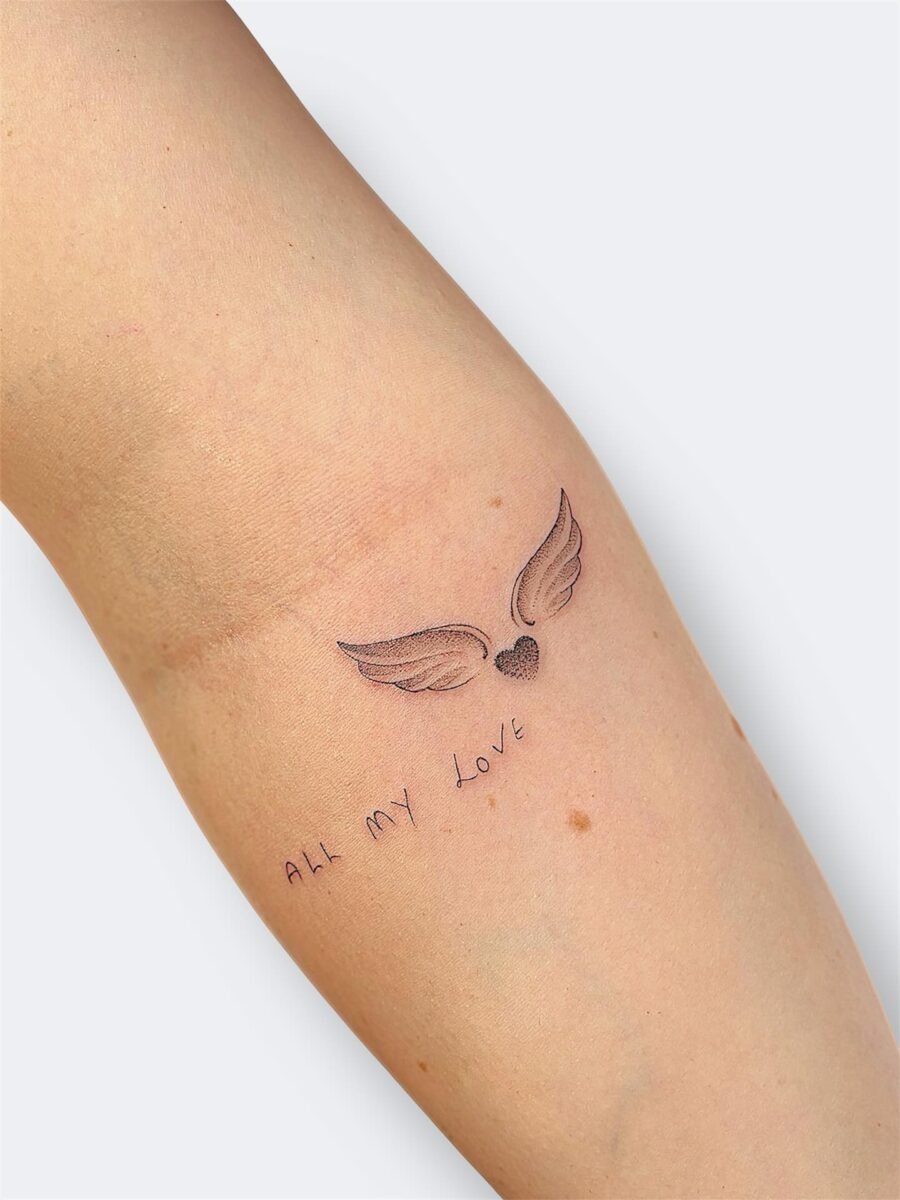 Heartfelt tribute with angel wings and lettering Tattoo Design