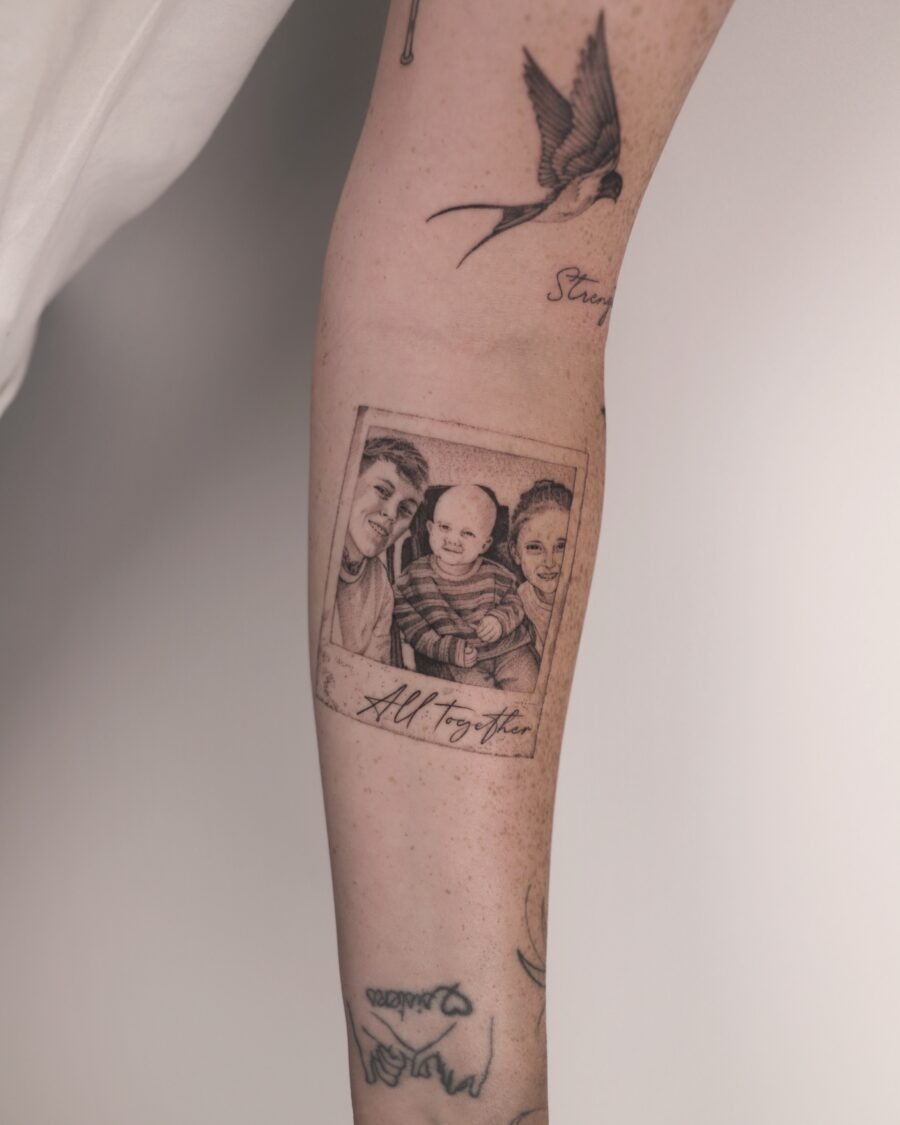 Tribute tattoo featuring cherished family photo Tattoo Design