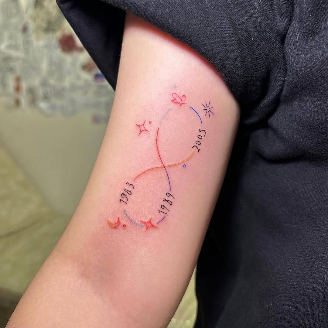Colorful infinity tattoo with personal years Tattoo Design