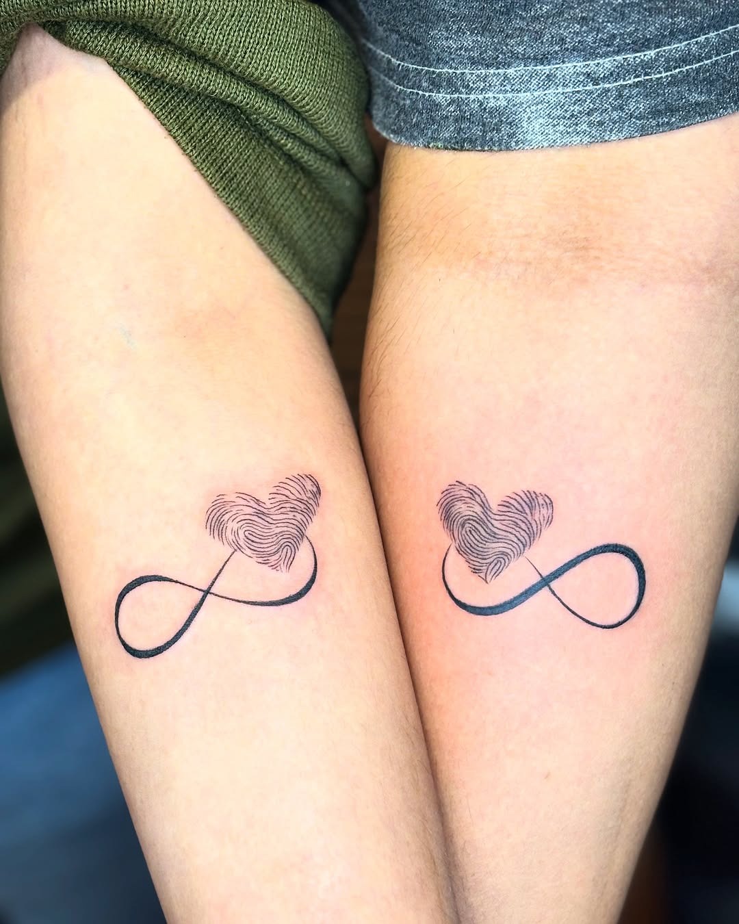 Elegant infinity love tattoos on forearms Tattoo Design