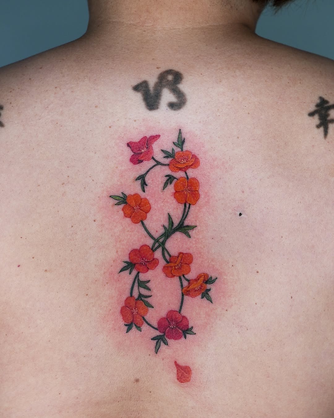 Elegant infinity tattoo with birds and floral details Tattoo Design