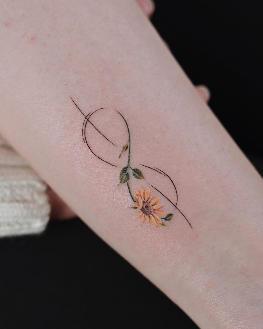 Elegant infinity tattoo with meaningful symbols Tattoo Design