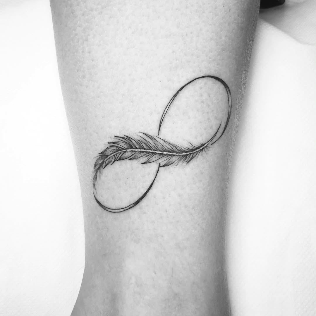 Elegant minimalist infinity tattoo on the side Tattoo Design