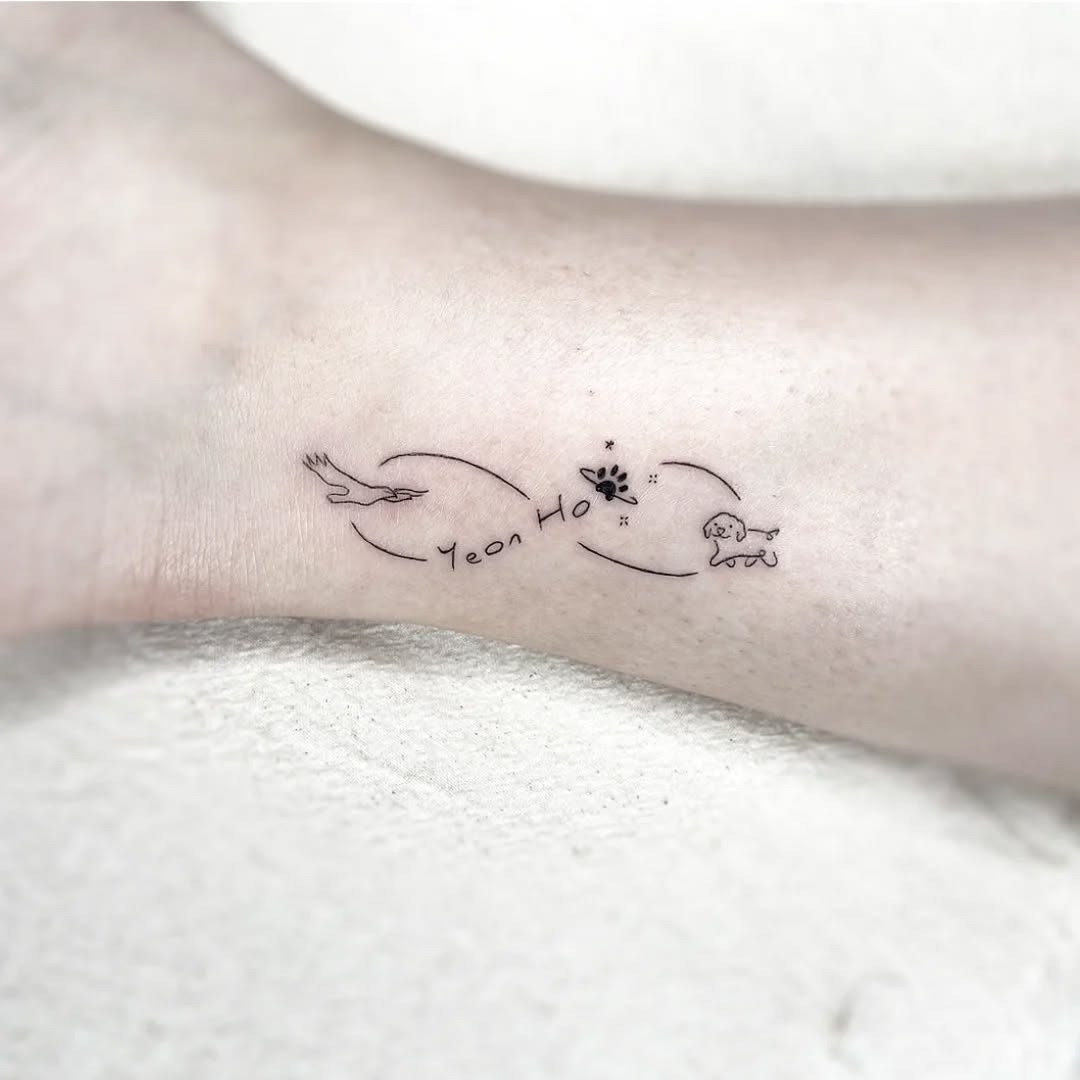 Symbolic infinity tattoo with animal motifs Tattoo Design