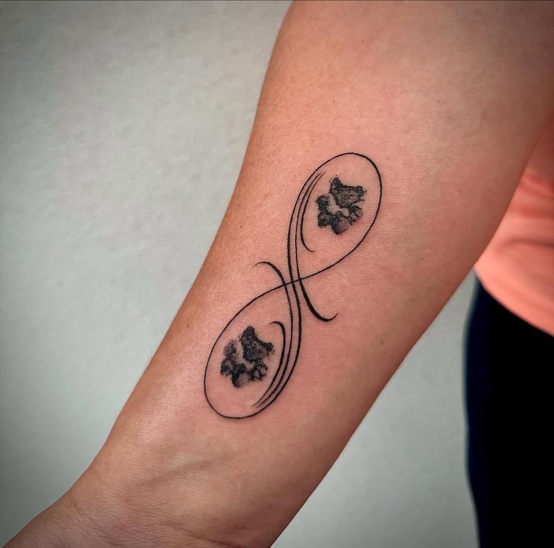 Unique Infinity Tattoo with Lovely Floral Accents Tattoo Design