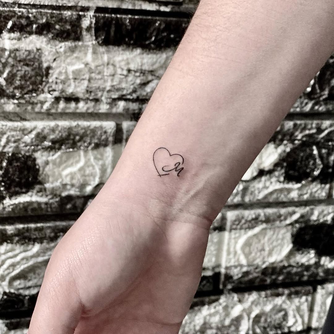 Charming Minimalist Initials Heart Tattoo Tattoo Design