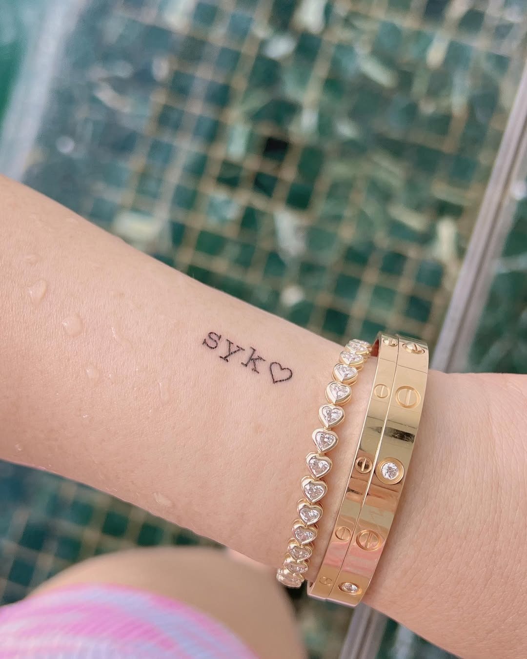 Stylish Initials Tattoo on Delicate Wrist Tattoo Design