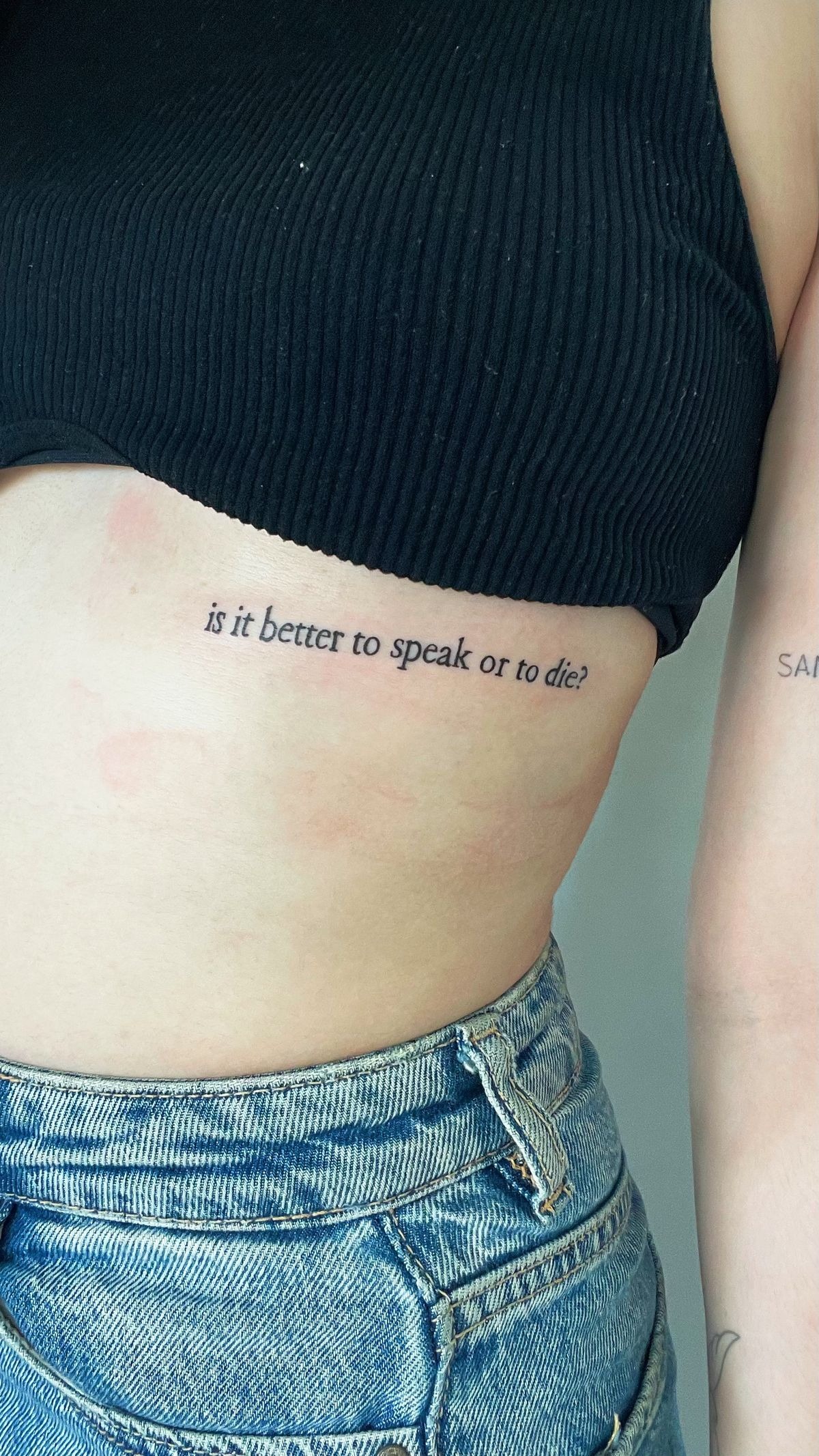 Is It Better to Speak or to Die?, a tattoo design rendered in clean detailed linework for the rib.