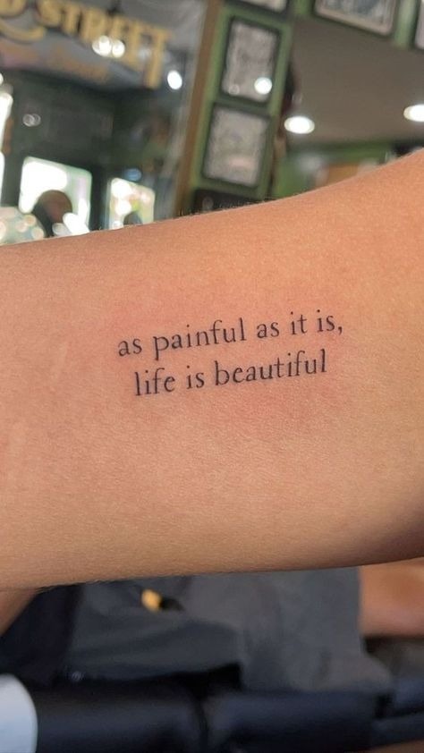Life Is Beautiful, a tattoo design rendered in clean detailed linework.
