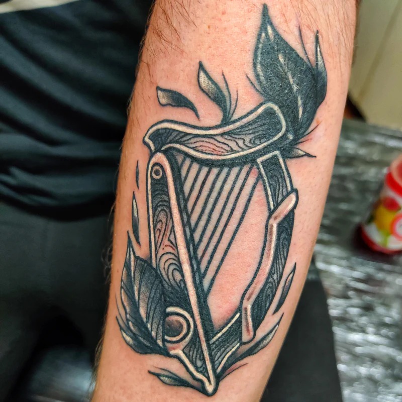 Harp Tattoo with Flowing Design Tattoo Design
