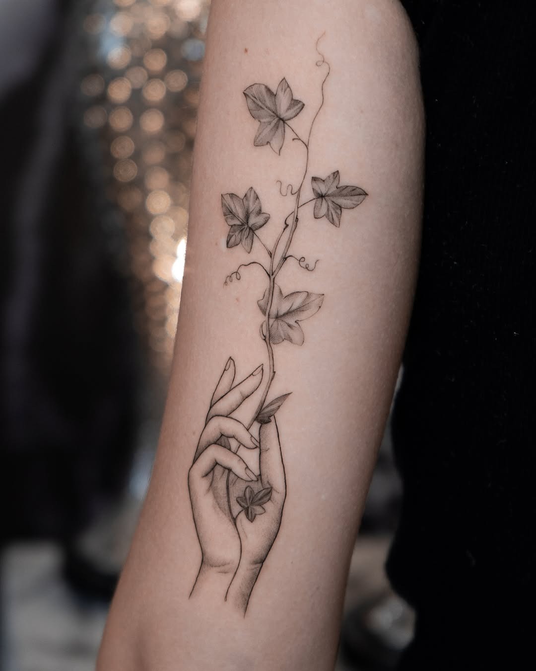Elegant Ivy Tattoo Embracing a Delicate Hand Tattoo Design
