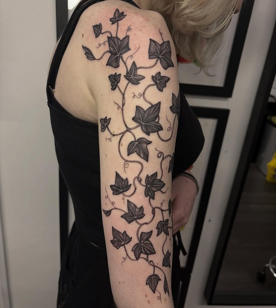 Elegant Ivy Tattoo Sprouting Along the Arm Tattoo Design