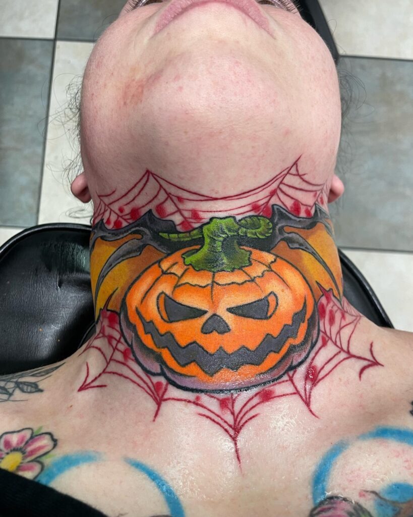Fierce Jack O' Lantern Neck Tattoo with Web Accents Tattoo Design