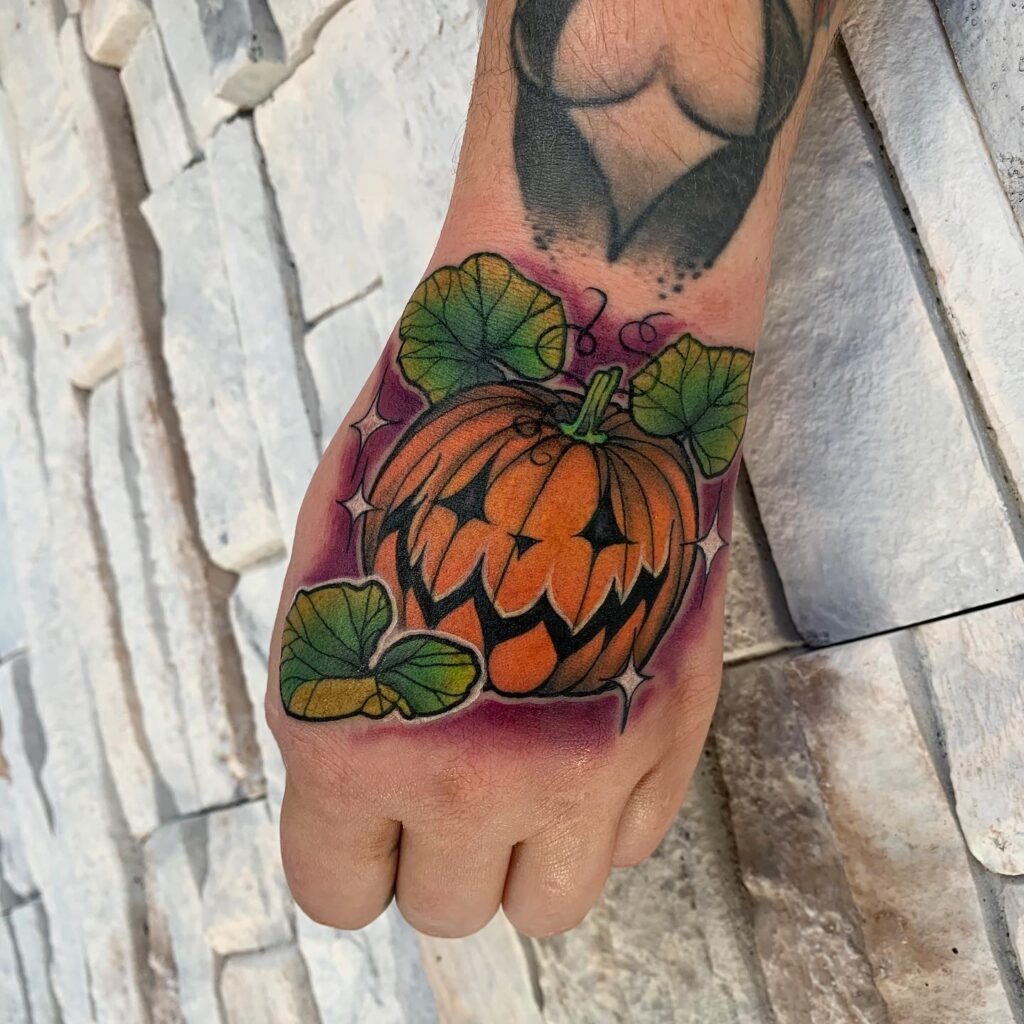 Hand Jack O' Lantern Tattoo with Vines Tattoo Design