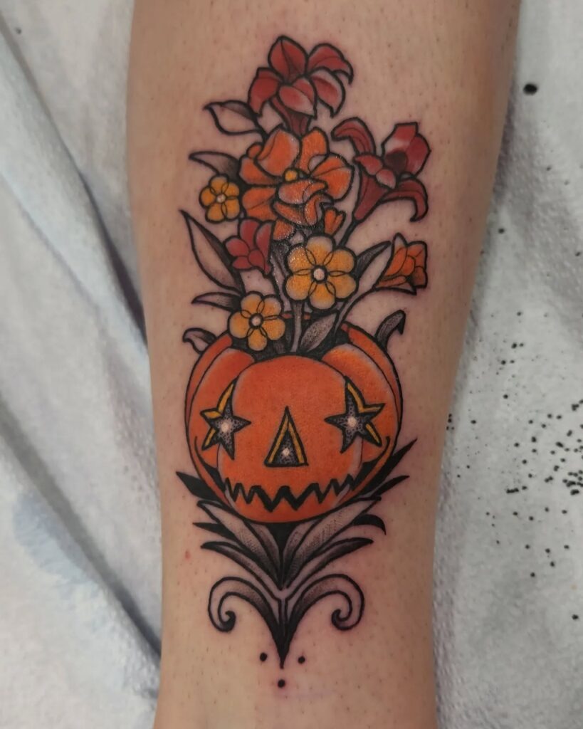 Jack O' Lantern Vase with Blooming Flowers Tattoo Tattoo Design