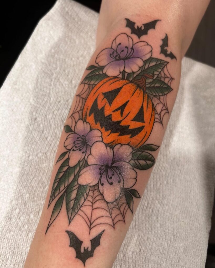 Jack O' Lantern with Flowers and Bats Tattoo Tattoo Design
