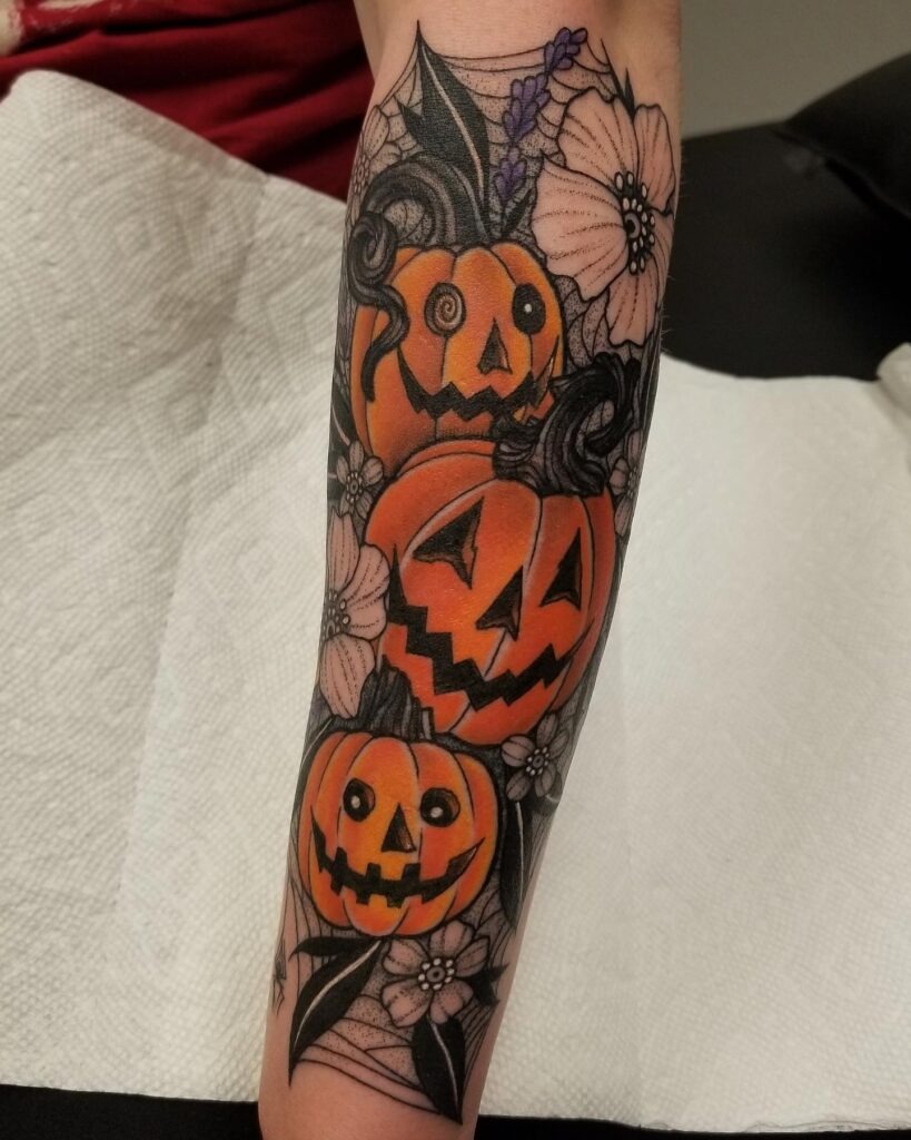 Trio of Jack O' Lanterns with Flowers Tattoo Tattoo Design