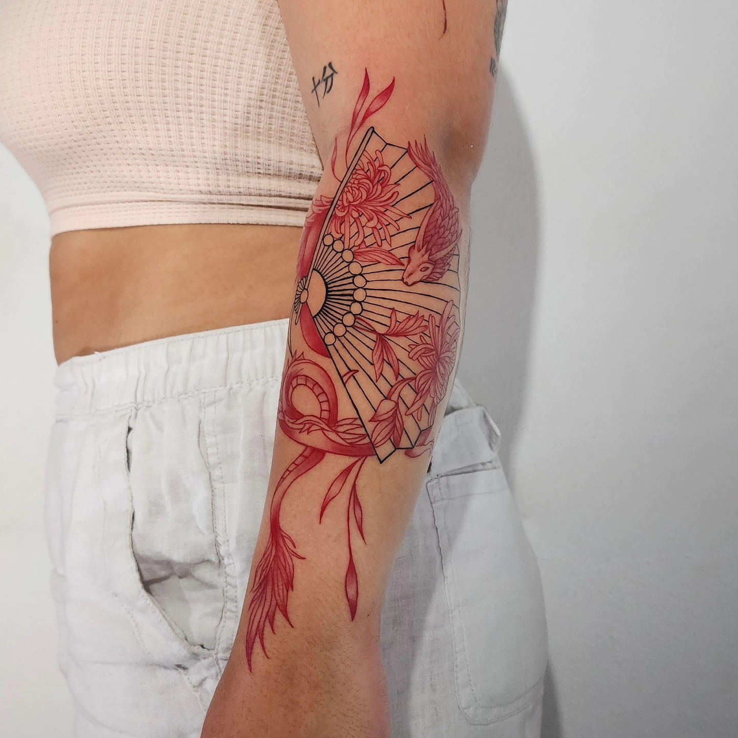 Red Japanese Dragon and Fan Tattoo Tattoo Design