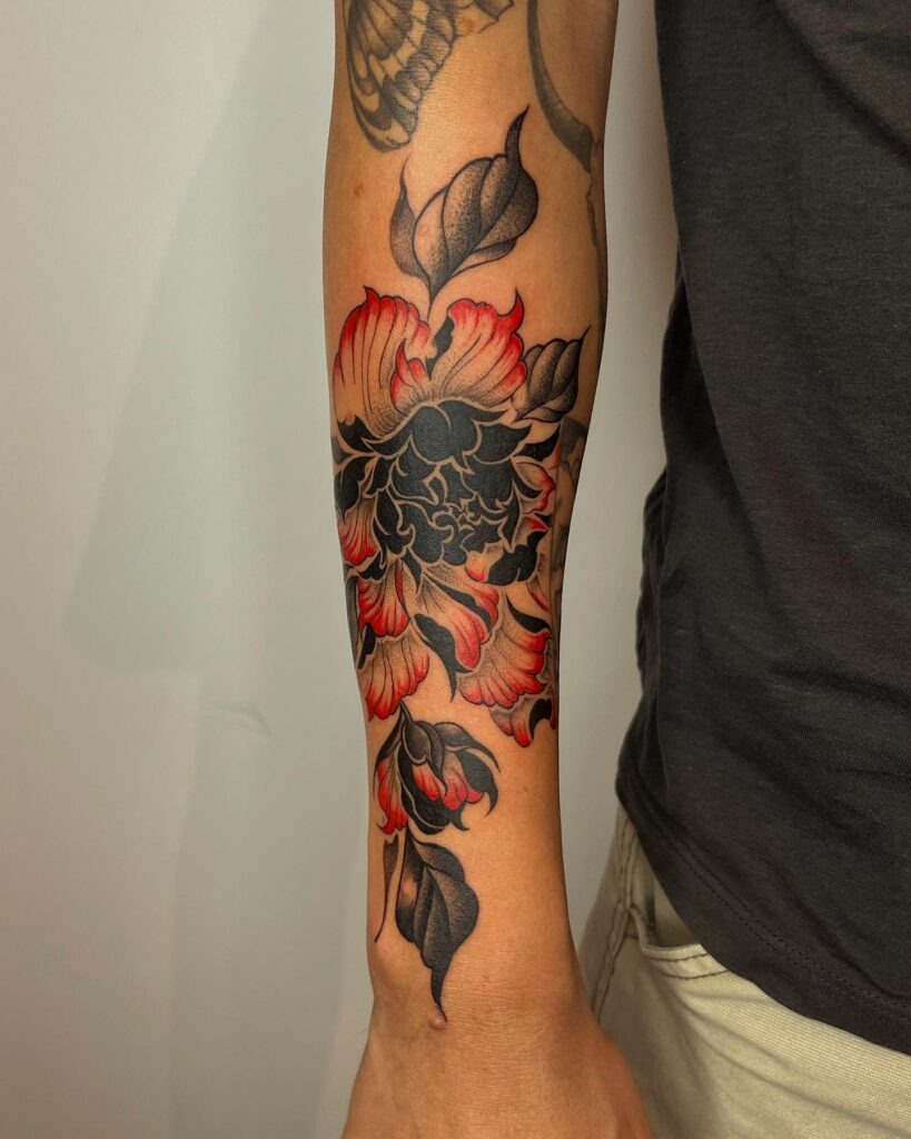 Black and Red Peony Forearm Tattoo with Textured Leaves Tattoo Design
