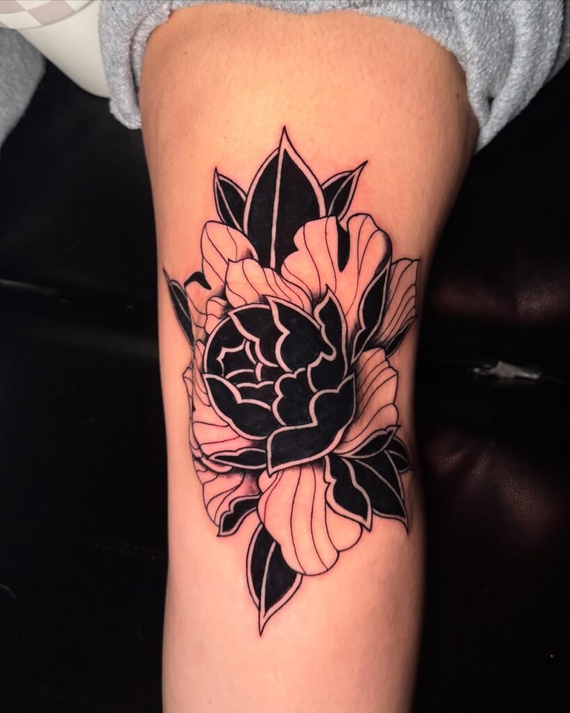 Bold Blackwork Peony on Thigh Tattoo Design