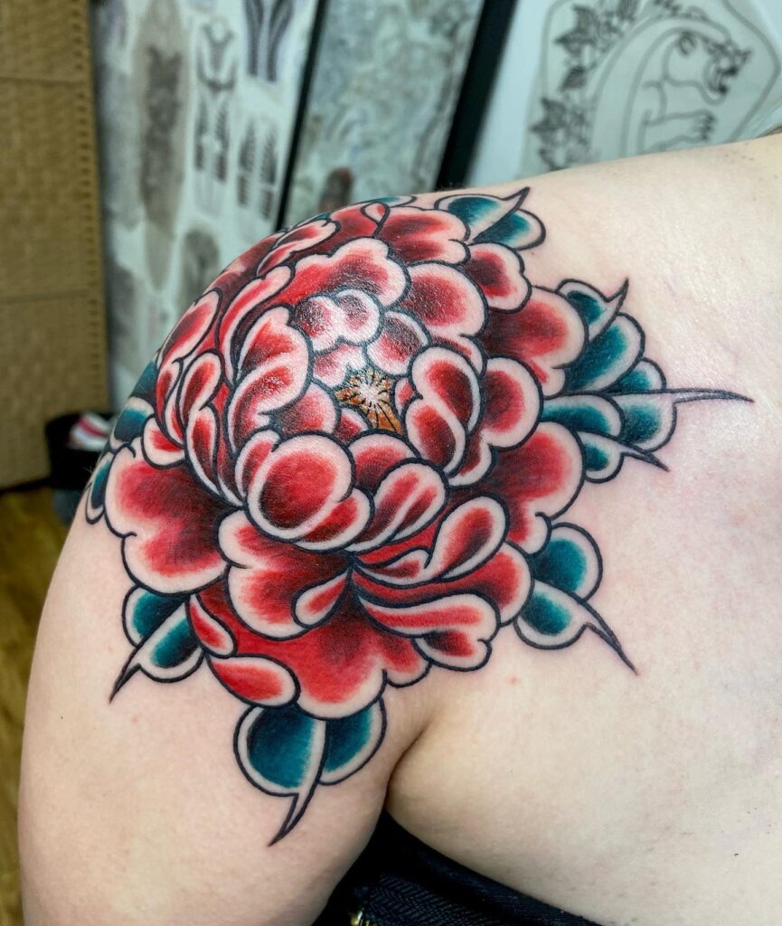 Shoulder-Capped Japanese Peony Tattoo with Bold Shading Tattoo Design