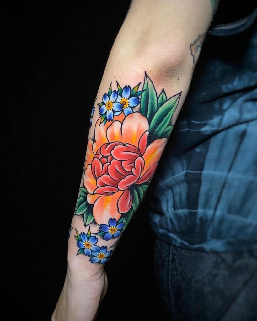 Vibrant Peony and Blue Flower Forearm Tattoo Tattoo Design