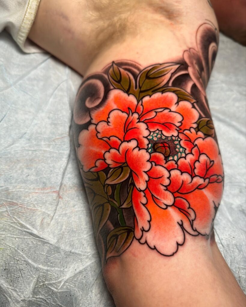 Vibrant Peony Inner Arm Tattoo with Classic Irezumi Style Tattoo Design