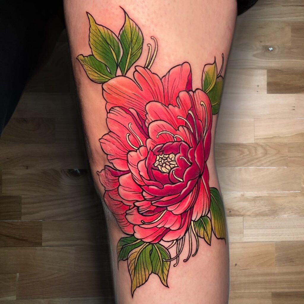 Vibrant Peony Thigh Tattoo with Lush Green Leaves Tattoo Design