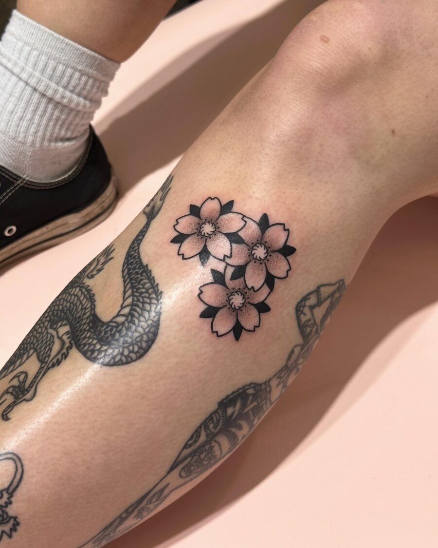 Elegant cherry blossoms tattoo on the calf Tattoo Design