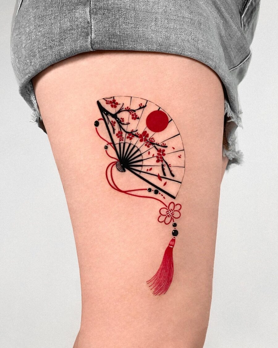 Elegant Japanese fan tattoo with floral details Tattoo Design