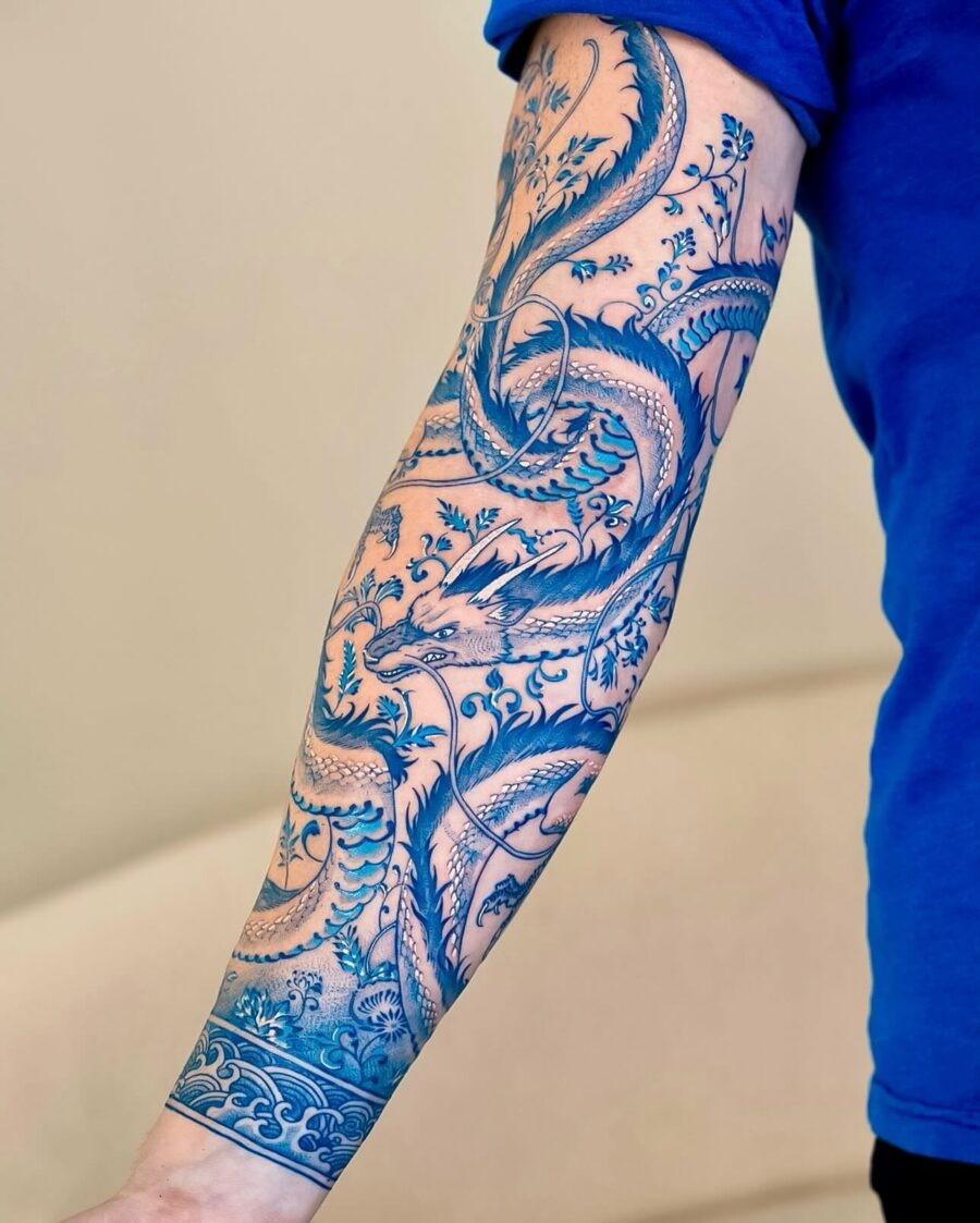 Elegant Japanese tattoo with vibrant blue tones Tattoo Design
