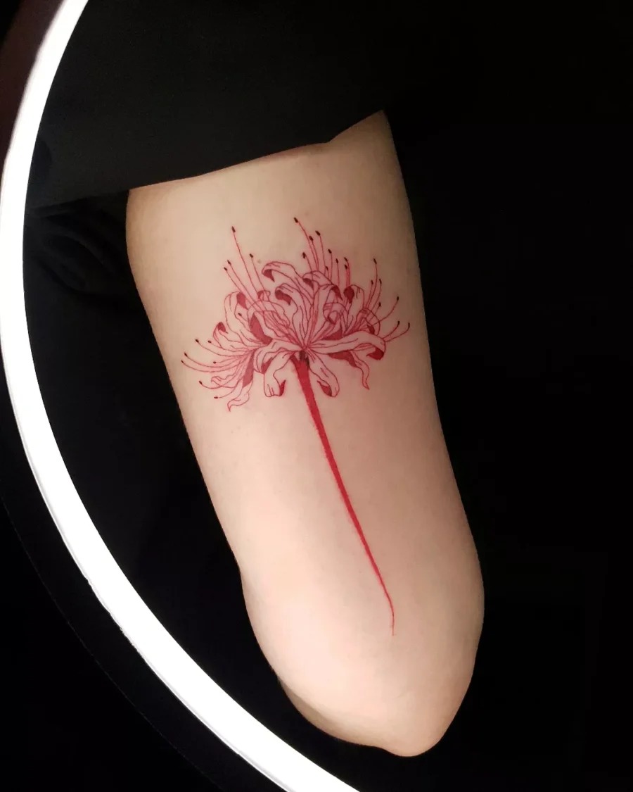 Elegant red flower tattoo on the forearm Tattoo Design