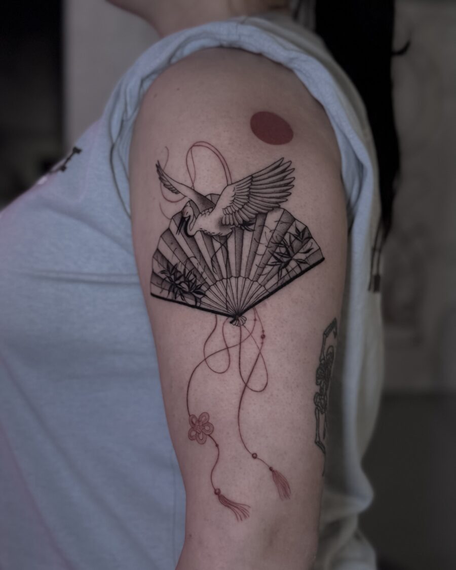 Elegant swan tattoo with traditional elements Tattoo Design