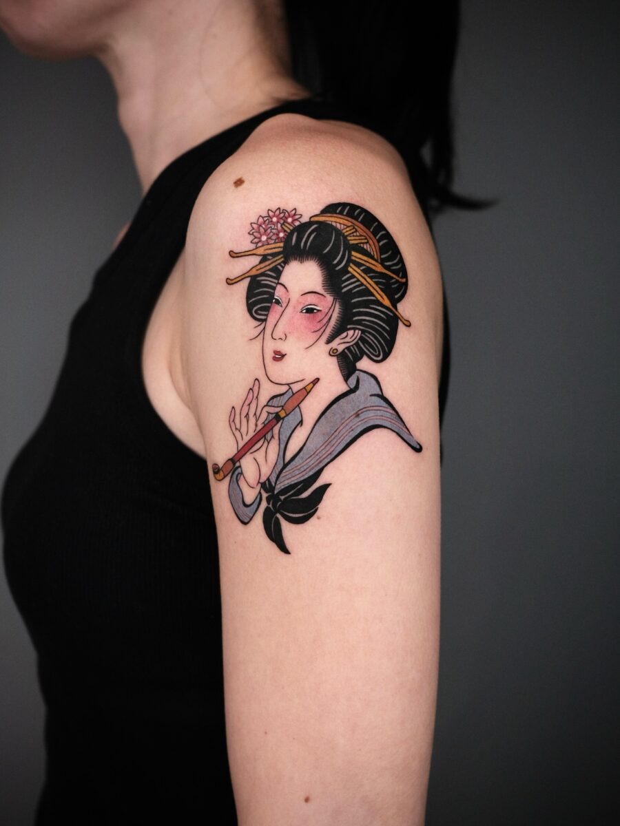 Graceful geisha with a flute tattoo design Tattoo Design