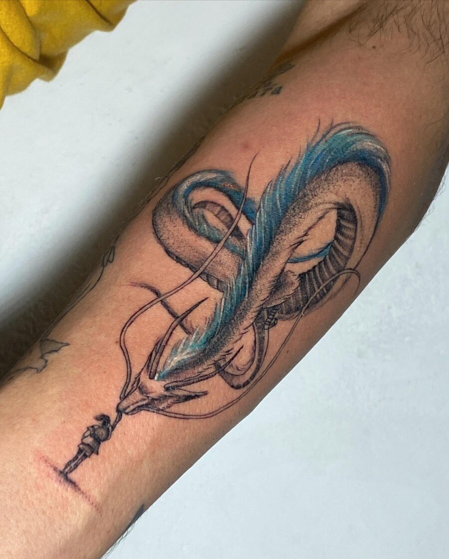 Intricate Japanese dragon tattoo with vibrant blue accents Tattoo Design
