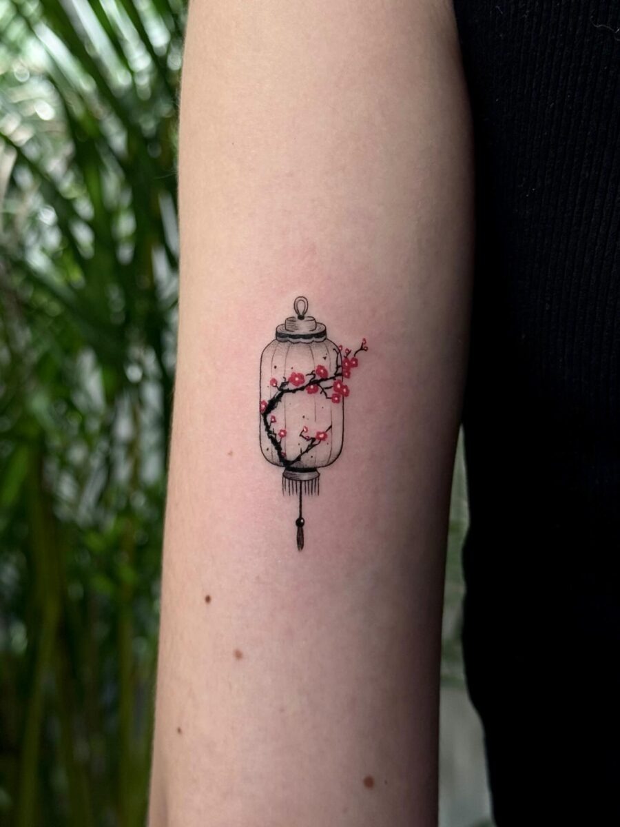 Intricate Japanese Jar Tattoo with Cherry Blossoms Tattoo Design
