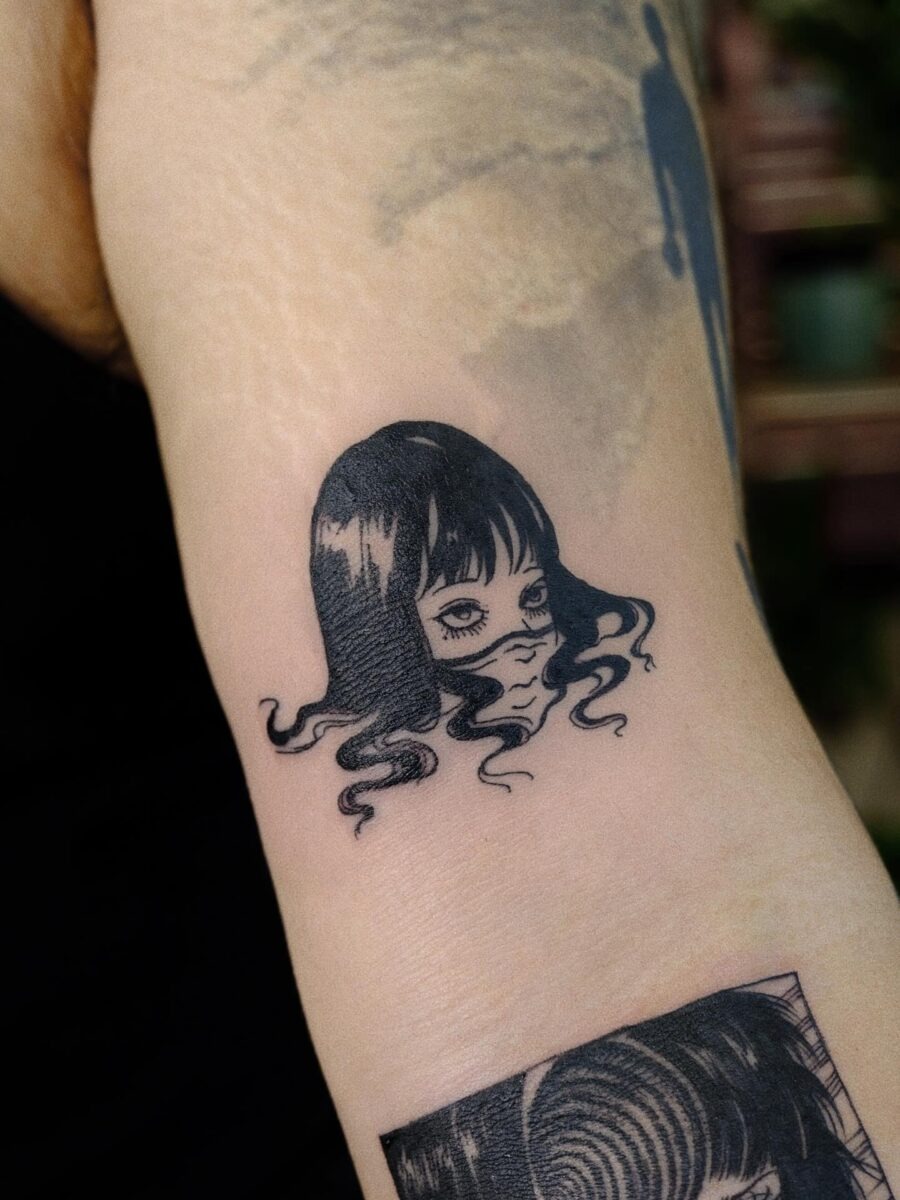 Intricate Japanese tattoo depicting a woman’s face Tattoo Design