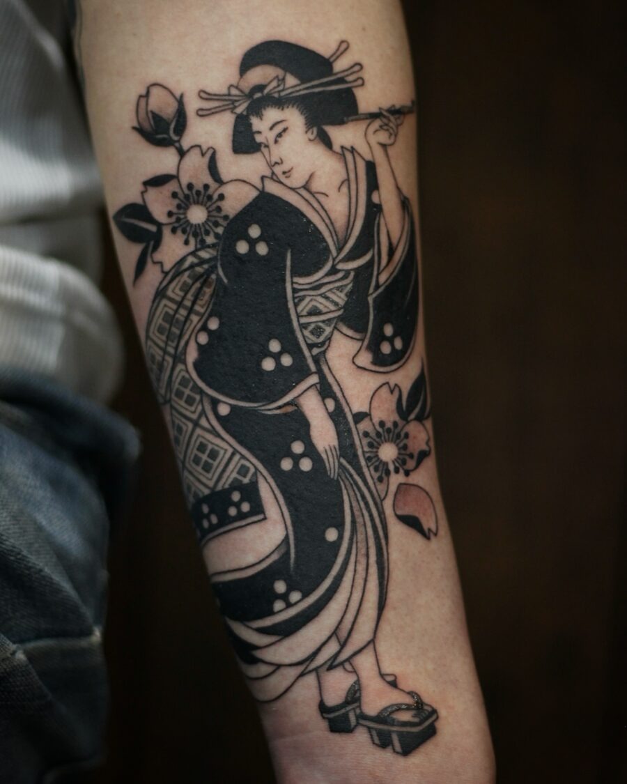 Stunning geisha design with floral accents Tattoo Design