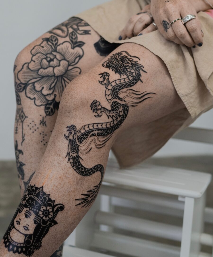 Stunning Japanese dragon tattoo on kneecap Tattoo Design
