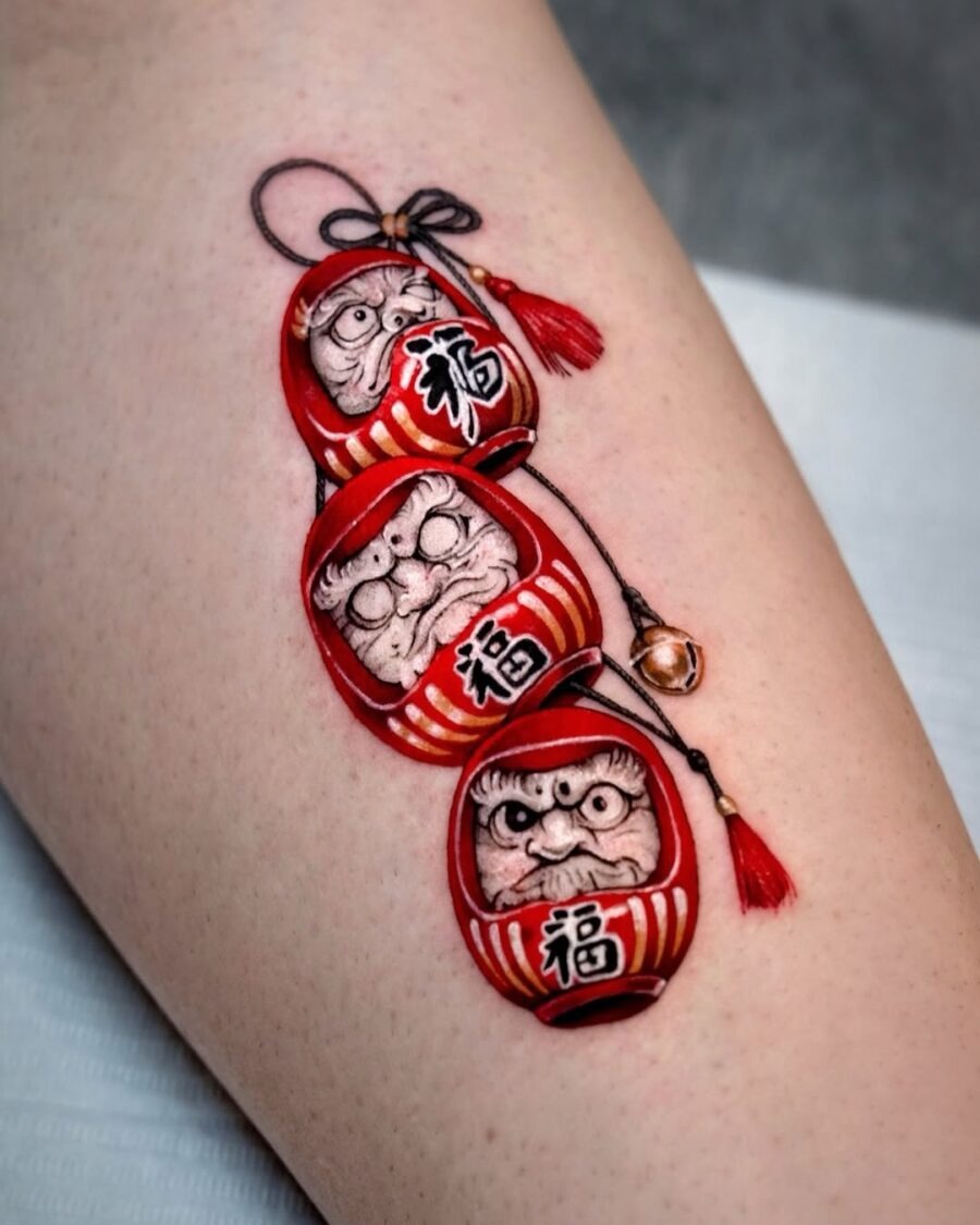 Vibrant Daruma Doll Tattoo Symbolizing Luck Tattoo Design