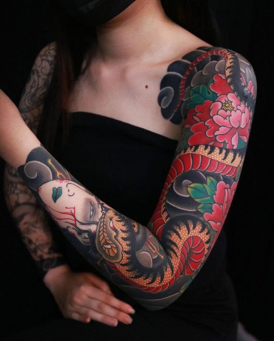 Vibrant Japanese Tattoo Sleeve with Intricate Designs Tattoo Design